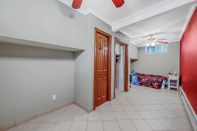 557 Newbridge Rd, East Meadow, NY 11554 - hall featuring a baseboard heating unit, ornamental molding, and light tile patterned floors