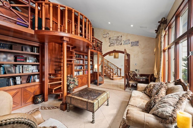 35 Jeffrey Pl, Staten Island, NY 10307 - living room featuring arched walkways, tile patterned floors, stairs, and recessed lighting