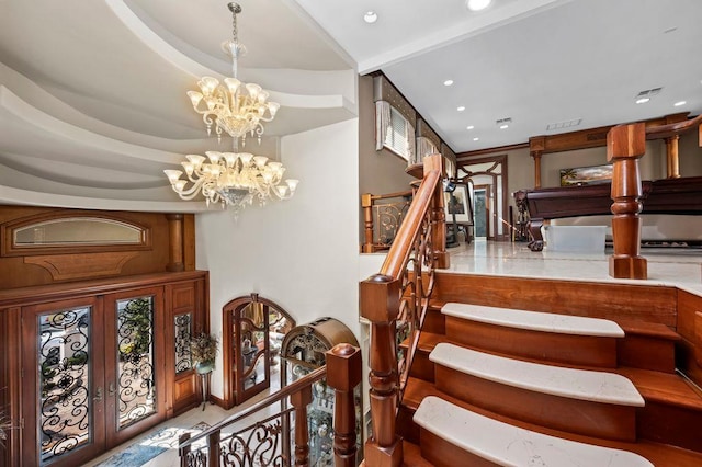 35 Jeffrey Pl, Staten Island, NY 10307 - staircase featuring a chandelier, recessed lighting, and french doors