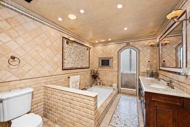 35 Jeffrey Pl, Staten Island, NY 10307 - full bathroom with tile walls, ornamental molding, a bath, double vanity, and recessed lighting
