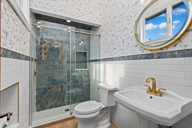 35 Jeffrey Pl, Staten Island, NY 10307 - full bath featuring tile walls, wainscoting, a stall shower, and wallpapered walls
