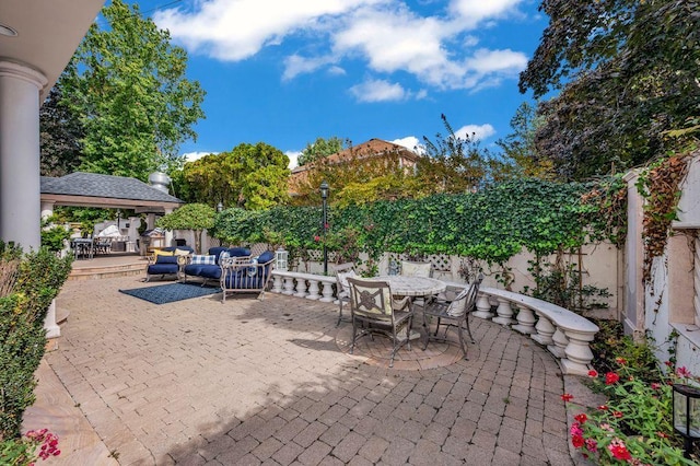 35 Jeffrey Pl, Staten Island, NY 10307 - fenced backyard featuring outdoor dining space, a patio, and a gazebo