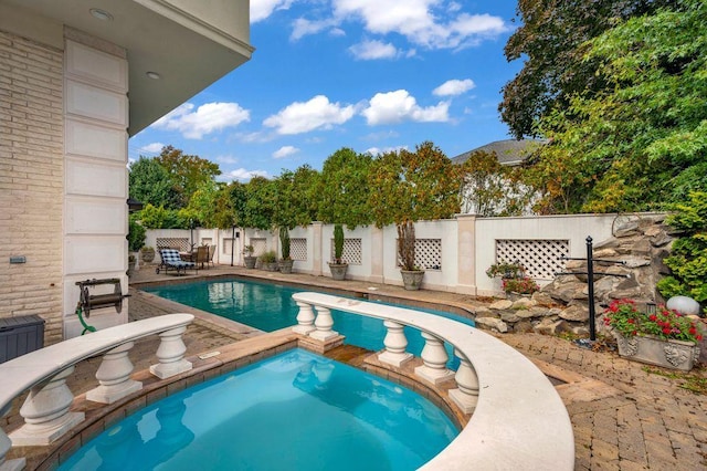 35 Jeffrey Pl, Staten Island, NY 10307 - view of swimming pool with a fenced backyard, a pool with connected hot tub, and a patio area