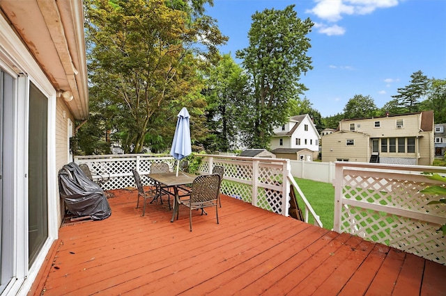 98 N Evarts Ave, Elmsford, NY 10523 - wooden terrace featuring outdoor dining space, a fenced backyard, and a residential view