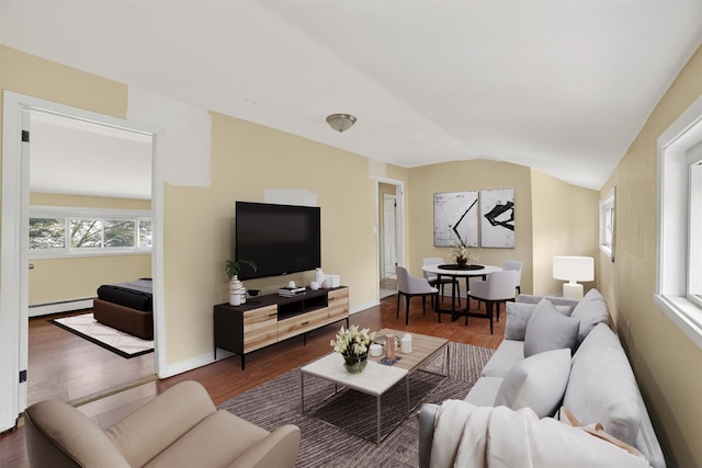 98 N Evarts Ave, Elmsford, NY 10523 - living area with a baseboard radiator, vaulted ceiling, and wood finished floors