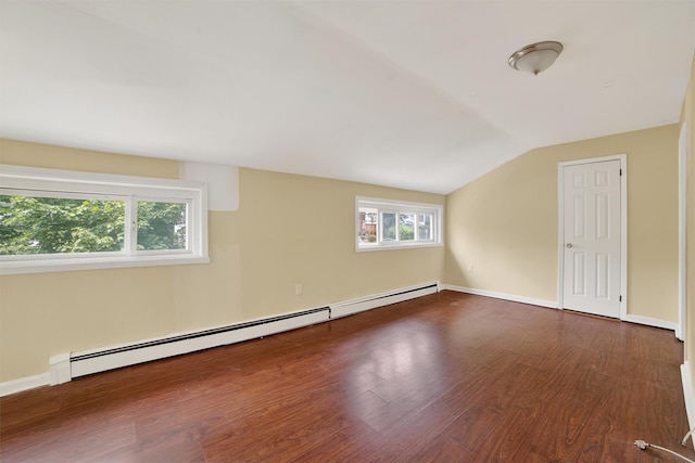 98 N Evarts Ave, Elmsford, NY 10523 - empty room with a baseboard heating unit, lofted ceiling, and dark wood-style floors