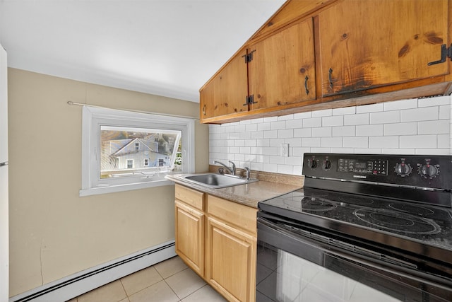 98 N Evarts Ave, Elmsford, NY 10523 - kitchen featuring electric range, a baseboard heating unit, backsplash, light tile patterned floors, and brown cabinets