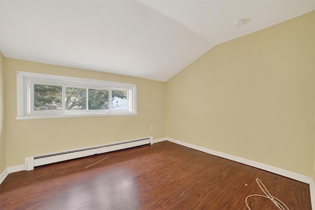 98 N Evarts Ave, Elmsford, NY 10523 - spare room featuring a baseboard heating unit, wood finished floors, lofted ceiling, and a smoke detector