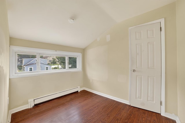 98 N Evarts Ave, Elmsford, NY 10523 - empty room with a baseboard radiator, lofted ceiling, dark wood-type flooring, and a smoke detector