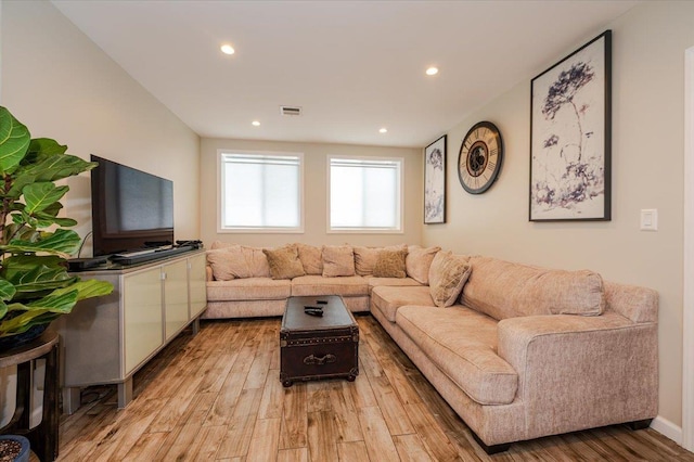 137 Jefferson St, Inwood, NY 11096 - living room with light wood-style flooring and recessed lighting