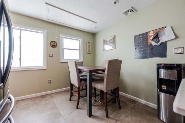 137 Jefferson St, Inwood, NY 11096 - dining space with attic access and baseboards