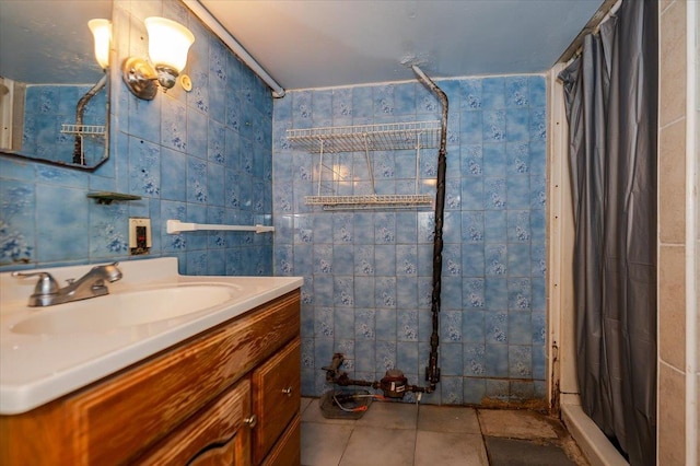 137 Jefferson St, Inwood, NY 11096 - full bath featuring a shower stall, vanity, and tile walls
