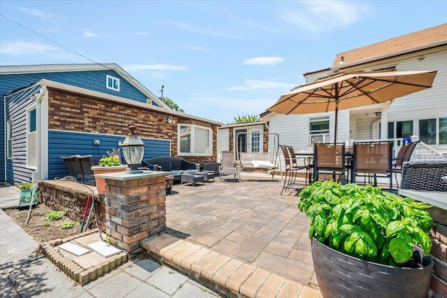 137 Jefferson St, Inwood, NY 11096 - view of patio featuring an outdoor hangout area and outdoor dining area