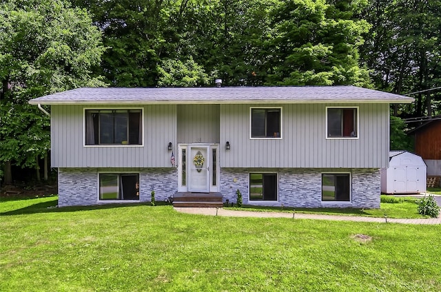 49 Raker Rd, Poughkeepsie, NY 12603 - raised ranch with a shed, a front yard, and entry steps