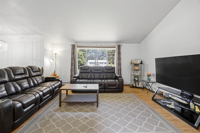 49 Raker Rd, Poughkeepsie, NY 12603 - living area featuring wood finished floors and a chandelier