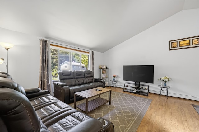 49 Raker Rd, Poughkeepsie, NY 12603 - living area with vaulted ceiling and wood finished floors