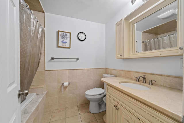 49 Raker Rd, Poughkeepsie, NY 12603 - full bath with tile patterned flooring, vanity, tile walls, a wainscoted wall, and a shower with curtain