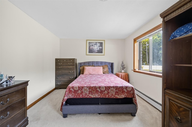49 Raker Rd, Poughkeepsie, NY 12603 - bedroom featuring a baseboard heating unit and light colored carpet