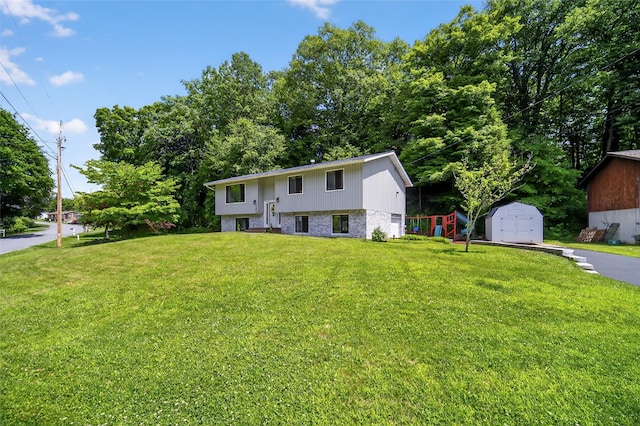 49 Raker Rd, Poughkeepsie, NY 12603 - split foyer home featuring a storage unit, a front lawn, and a playground