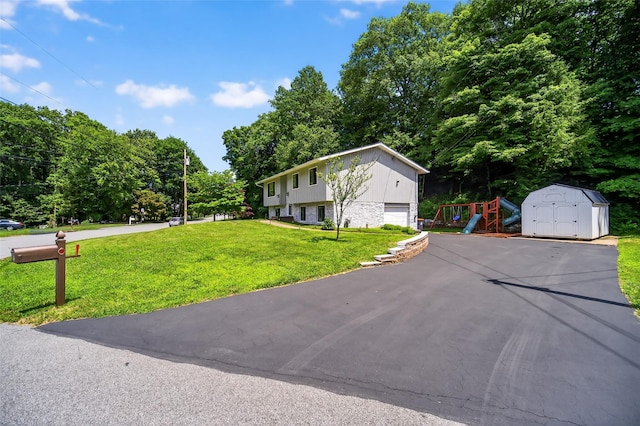 49 Raker Rd, Poughkeepsie, NY 12603 - raised ranch with a shed, a front yard, driveway, and an attached garage