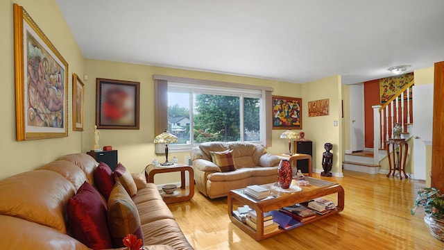 2334 Belmont Ave, Elmont, NY 11003 - living room with stairway and light wood-type flooring