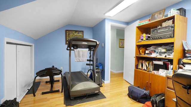2334 Belmont Ave, Elmont, NY 11003 - exercise room featuring light wood-style floors and vaulted ceiling