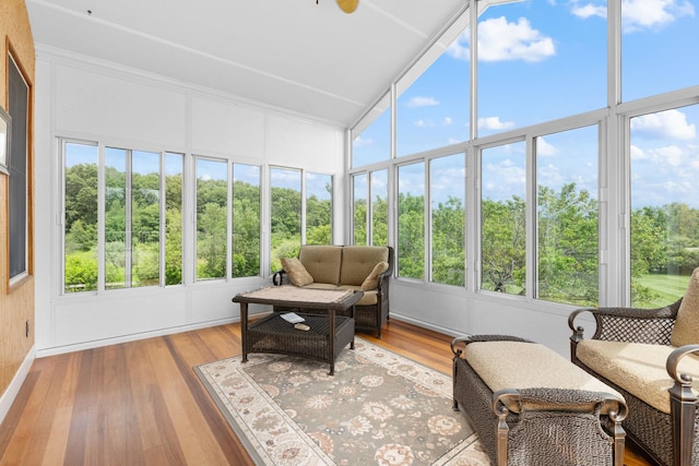 17 Conover Way, Lagrangeville, NY 12540 - sunroom featuring wood finished floors, healthy amount of natural light, and view of scattered trees