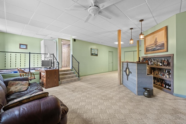 17 Conover Way, Lagrangeville, NY 12540 - living area featuring carpet flooring, a ceiling fan, stairway, and a paneled ceiling