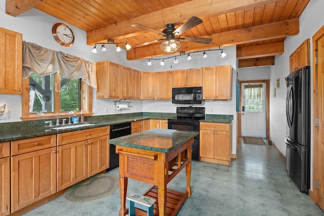 17 Conover Way, Lagrangeville, NY 12540 - kitchen with black appliances, a wood ceiling with exposed beams, dark countertops, and ceiling fan