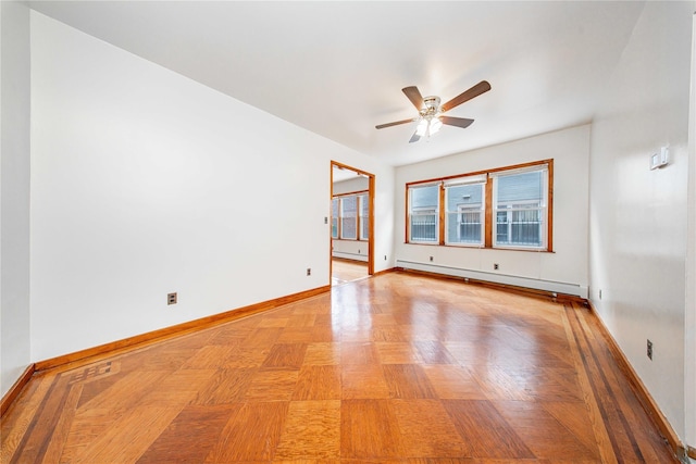 2162 24th St, Astoria, NY 11105 - spare room featuring a baseboard heating unit and ceiling fan