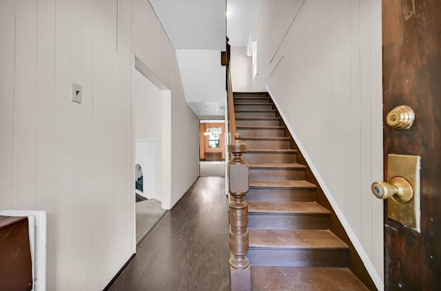 29 William St, Ossining, NY 10562 - staircase with wood finished floors and wooden walls