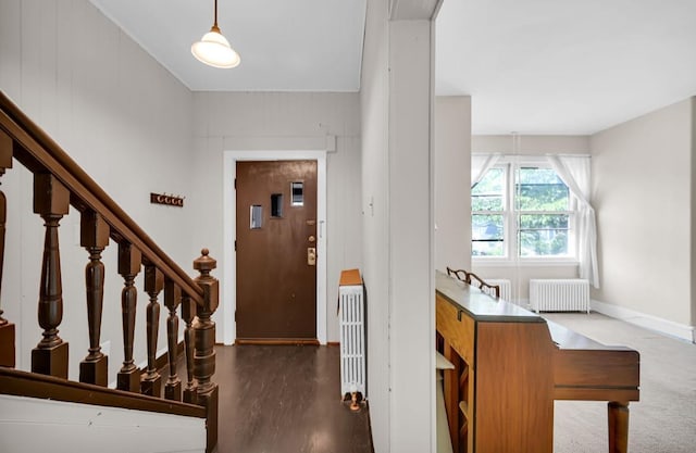 29 William St, Ossining, NY 10562 - entryway featuring radiator heating unit and stairway