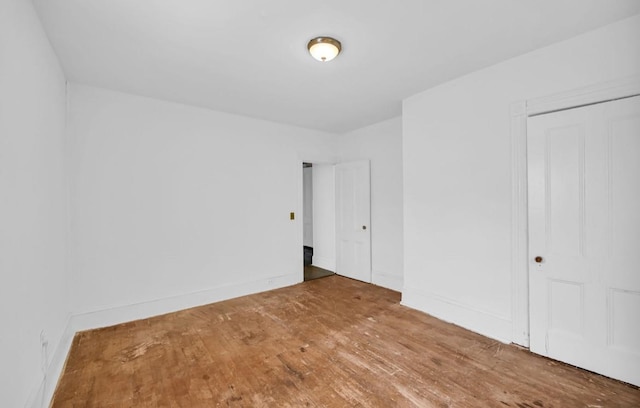 29 William St, Ossining, NY 10562 - unfurnished bedroom featuring wood finished floors and baseboards
