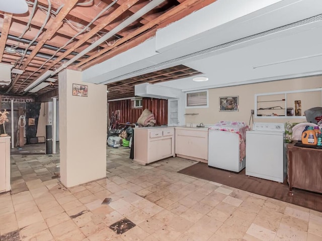 3227 Bruckner Blvd, Bronx, NY 10461 - below grade area with washing machine and dryer, refrigerator, and light floors