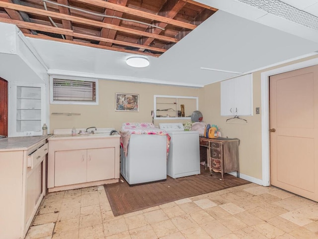 3227 Bruckner Blvd, Bronx, NY 10461 - laundry room featuring independent washer and dryer, cabinet space, and light flooring