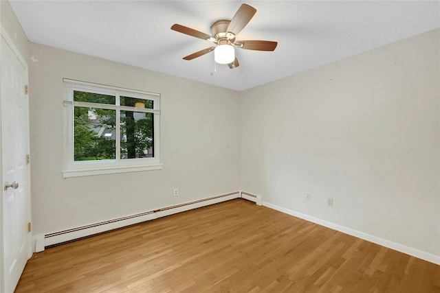 182 Arbor Crst, Somers, NY 10589 - spare room with a baseboard heating unit, light wood-style flooring, and a ceiling fan