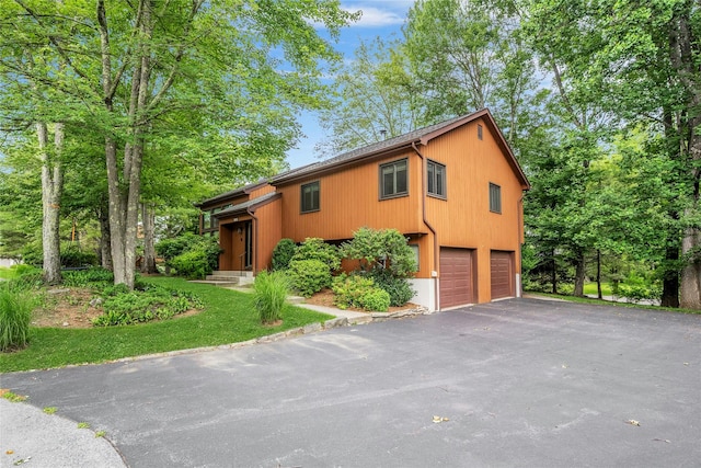 182 Arbor Crst, Somers, NY 10589 - view of front of house with driveway and an attached garage