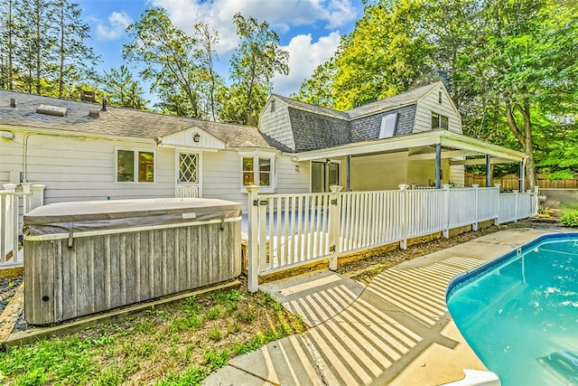 8 W Ln, South Salem, NY 10590 - back of house with a hot tub, a shingled roof, and a gambrel roof