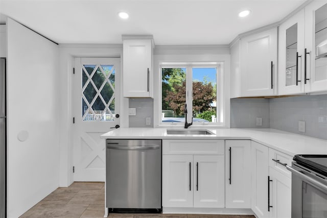 8 W Ln, South Salem, NY 10590 - kitchen featuring appliances with stainless steel finishes, tasteful backsplash, white cabinets, light countertops, and recessed lighting
