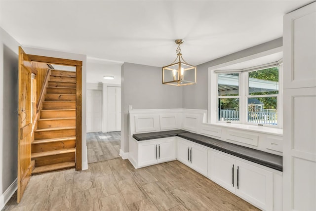 8 W Ln, South Salem, NY 10590 - unfurnished dining area featuring stairway and a chandelier