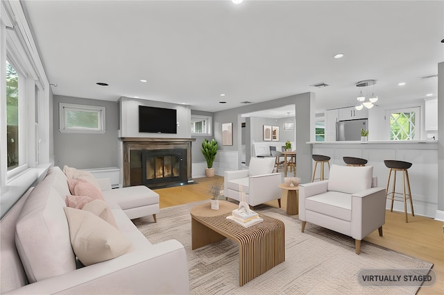 8 W Ln, South Salem, NY 10590 - living room with light wood finished floors, a glass covered fireplace, and recessed lighting