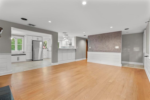 8 W Ln, South Salem, NY 10590 - unfurnished living room featuring light wood-style floors and recessed lighting
