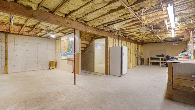 70 Wilson Ave, Mastic Beach, NY 11951 - below grade area featuring freestanding refrigerator