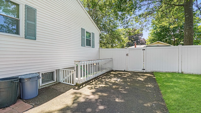 70 Wilson Ave, Mastic Beach, NY 11951 - view of patio featuring a gate