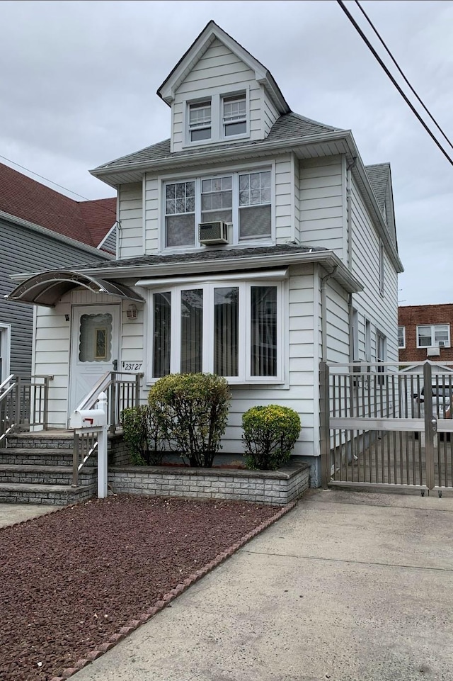 23727 Davenport Ave, Bellerose, NY 11426 - traditional style home featuring a gate and roof with shingles