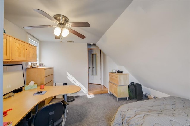 121 6th St, Hicksville, NY 11801 - carpeted bedroom with vaulted ceiling, a desk, and ceiling fan