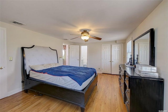 121 6th St, Hicksville, NY 11801 - bedroom with light wood finished floors, ceiling fan, and ensuite bathroom