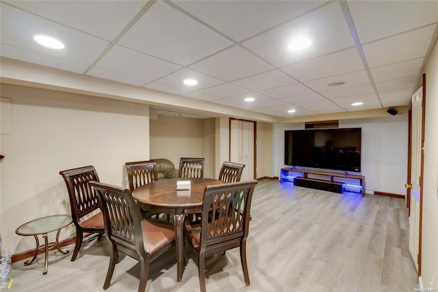 121 6th St, Hicksville, NY 11801 - dining area featuring light wood-style floors, a drop ceiling, and recessed lighting