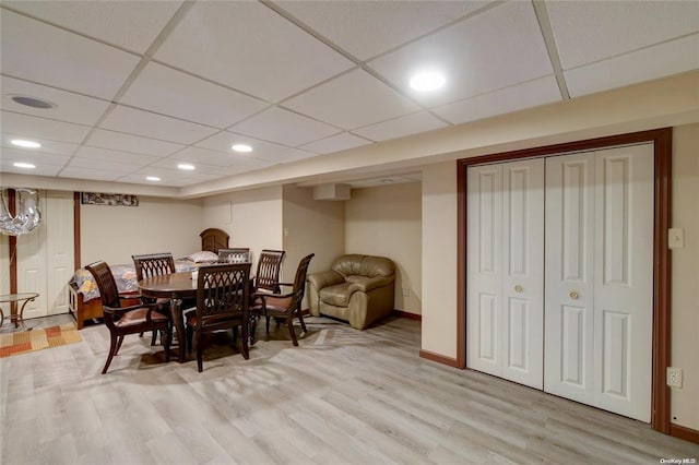 121 6th St, Hicksville, NY 11801 - dining room featuring light wood-style flooring, a drop ceiling, and recessed lighting