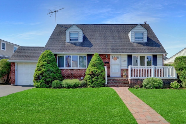 31 Amby Ave, Plainview, NY 11803 - cape cod home with a garage, a front lawn, brick siding, and a porch